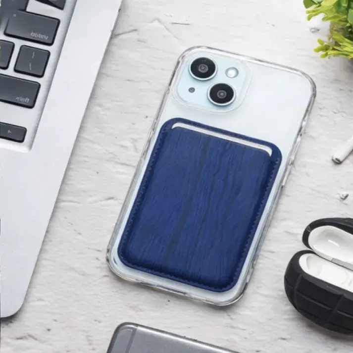 Blue wooden texture MagSafe wallet attached to a clear iPhone case.