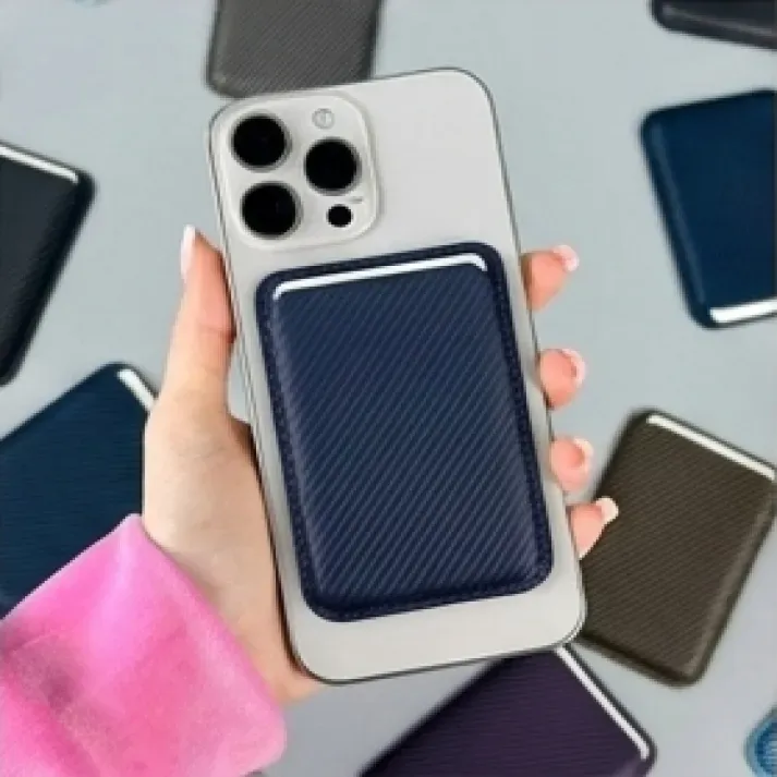 Minimalist carbon fiber MagSafe wallet attached to iPhone with RFID protection
