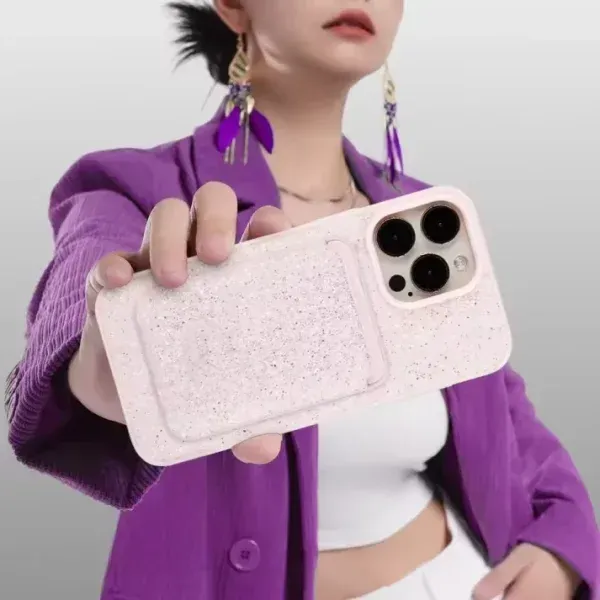 Swarovski-style crystal MagSafe wallet card holder attached to iPhone